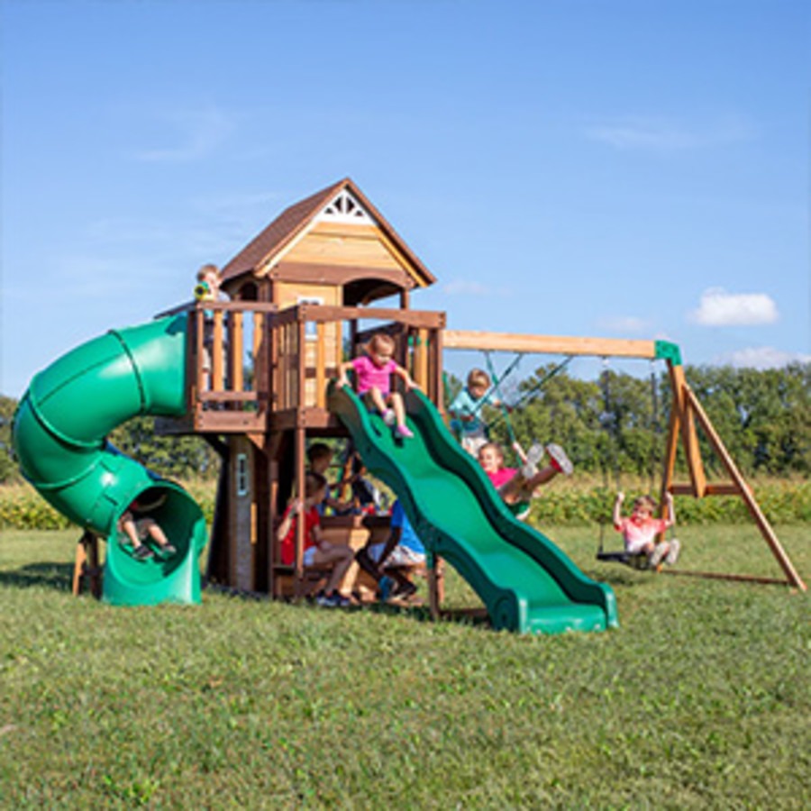 cedar-cove-swingset Backyard Discovery Cedar Cove Wooden Outdoor Swing Set with Tube Slide, Wave Slide, Clubhouse & Shaded Playhouse (2001053) - Image 1